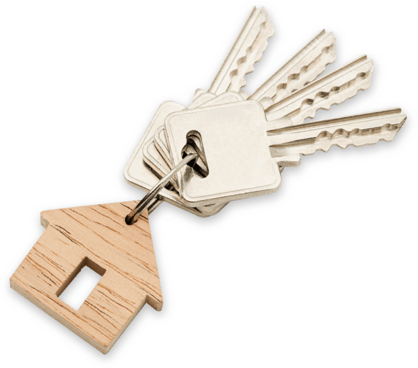 a group of keys with a wooden house shaped keychain